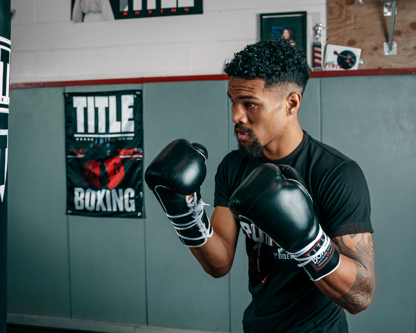 variant:black::TITLE Boxing Old School Leather Lace-Up Sparring Gloves boxing stance