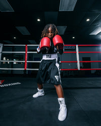 variant:black/white::TITLE Boxing Performance Aerovent Amateur Boxing Set 3.0  kid boxing pose