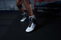 variant:lifestyle::TITLE Boxing Pro Ankle Weights both ankles