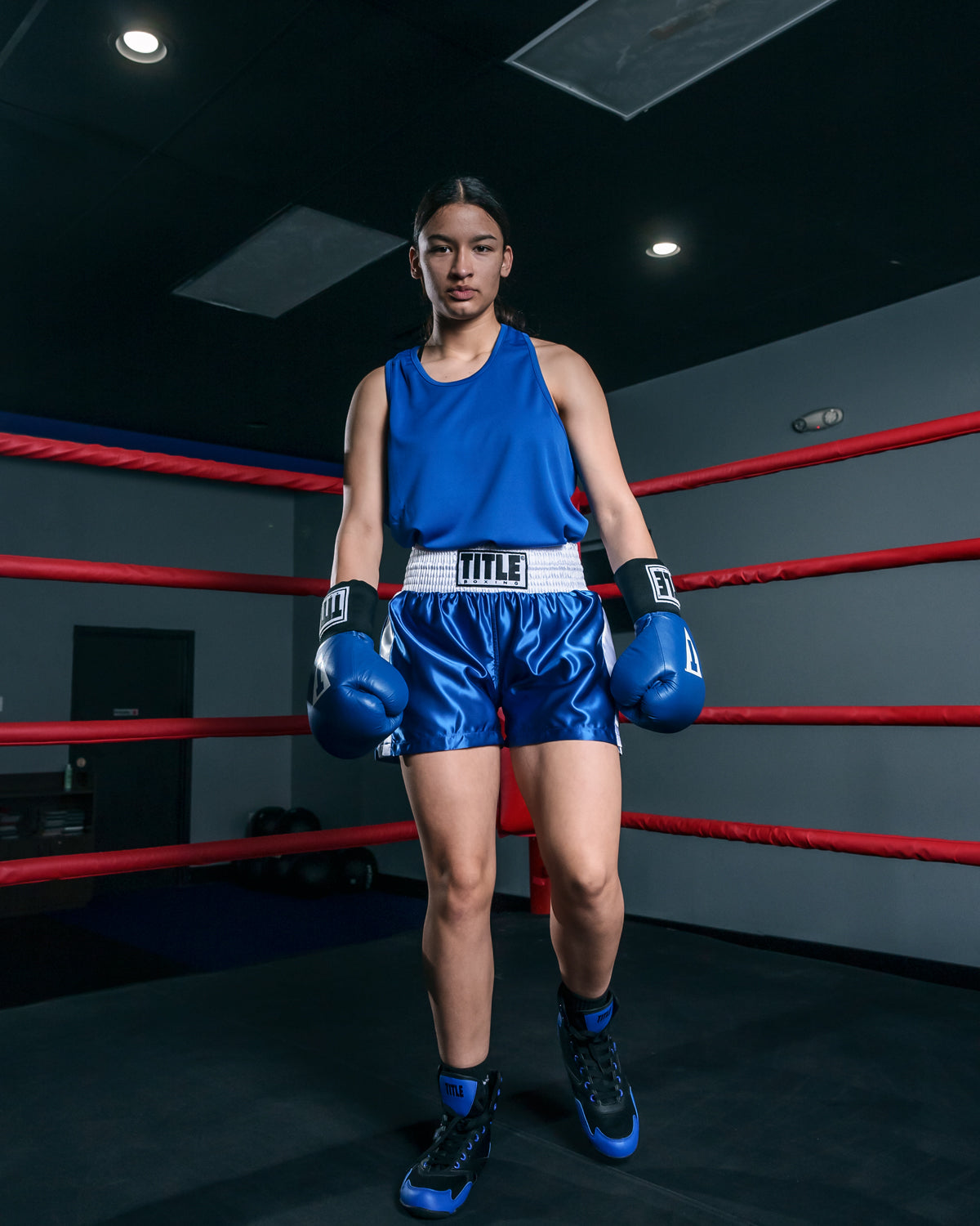 variant:blue/white::TITLE Boxing Professional Women’s Satin Striped Boxing Trunks girl in ring