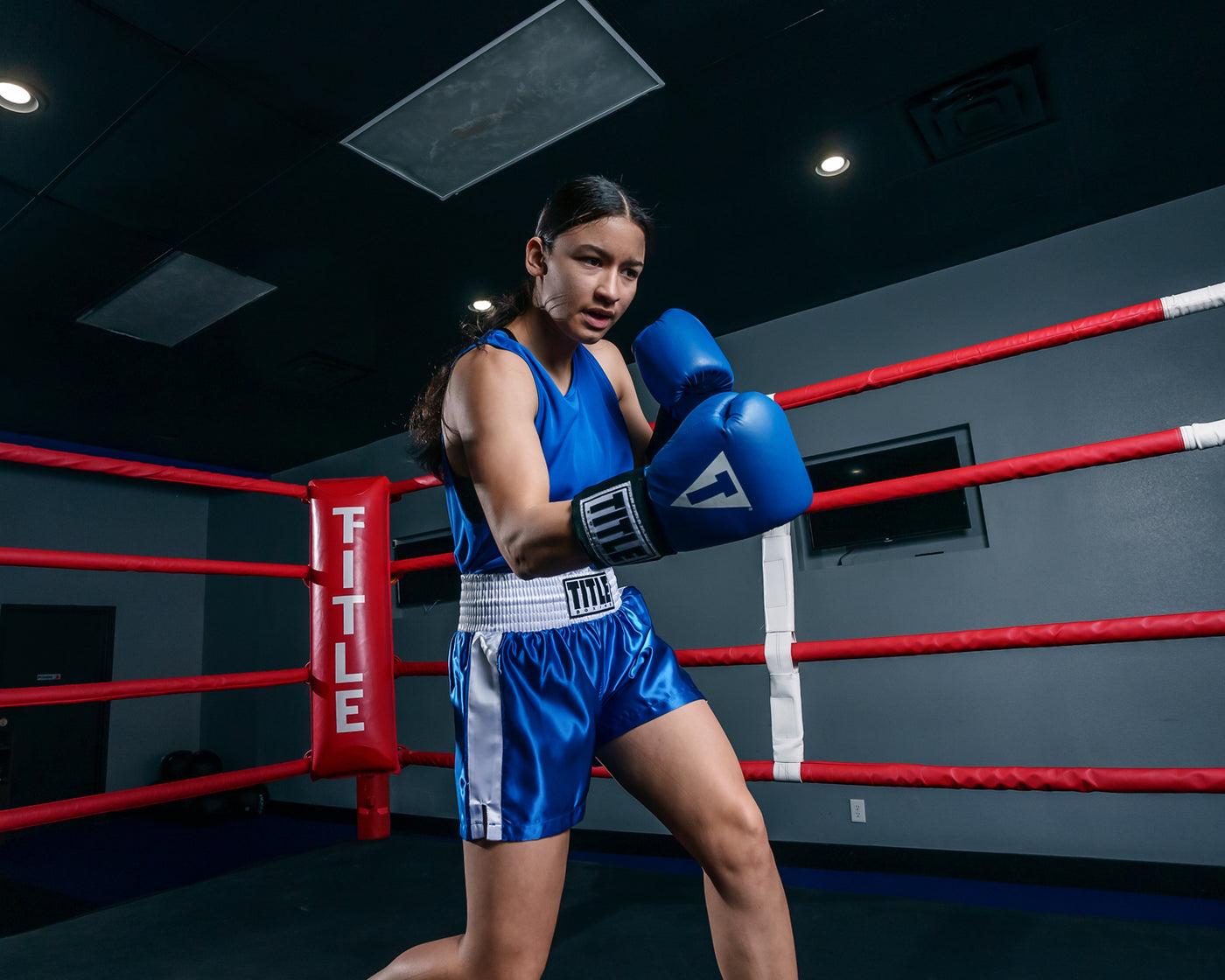 variant:blue/white::TITLE Boxing Professional Women’s Satin Striped Boxing Trunks girl boxing stance
