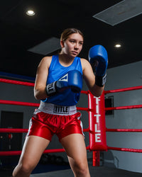 variant:red/white::TITLE Boxing Professional Women’s Satin Striped Boxing Trunks boxing stance