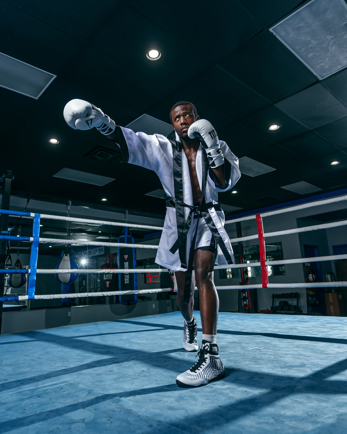 variant:white/black::TITLE Boxing Stock Fingertip Robe 2.0 boxing right jab in ring
