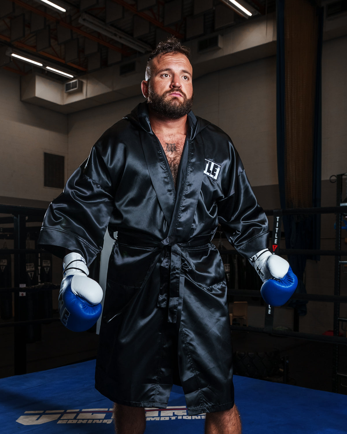 variant:black::TITLE Boxing Stock Full Length Robe 3.0 guy standing in ring