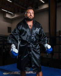 variant:black::TITLE Boxing Stock Full Length Robe 3.0 guy standing in ring