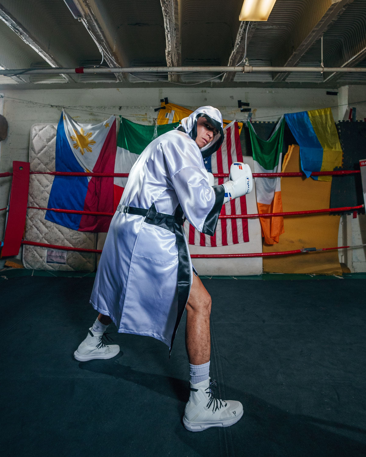 variant:white/black::TITLE Boxing Stock Full Length Robe 3.0 guy side view hood up