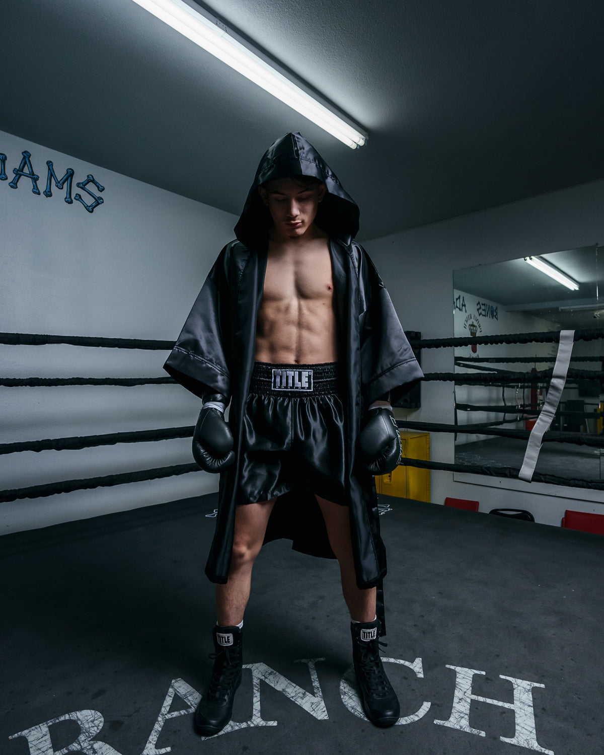 variant:black::TITLE Boxing Stock Fingertip Robe 2.0 guy hoods up