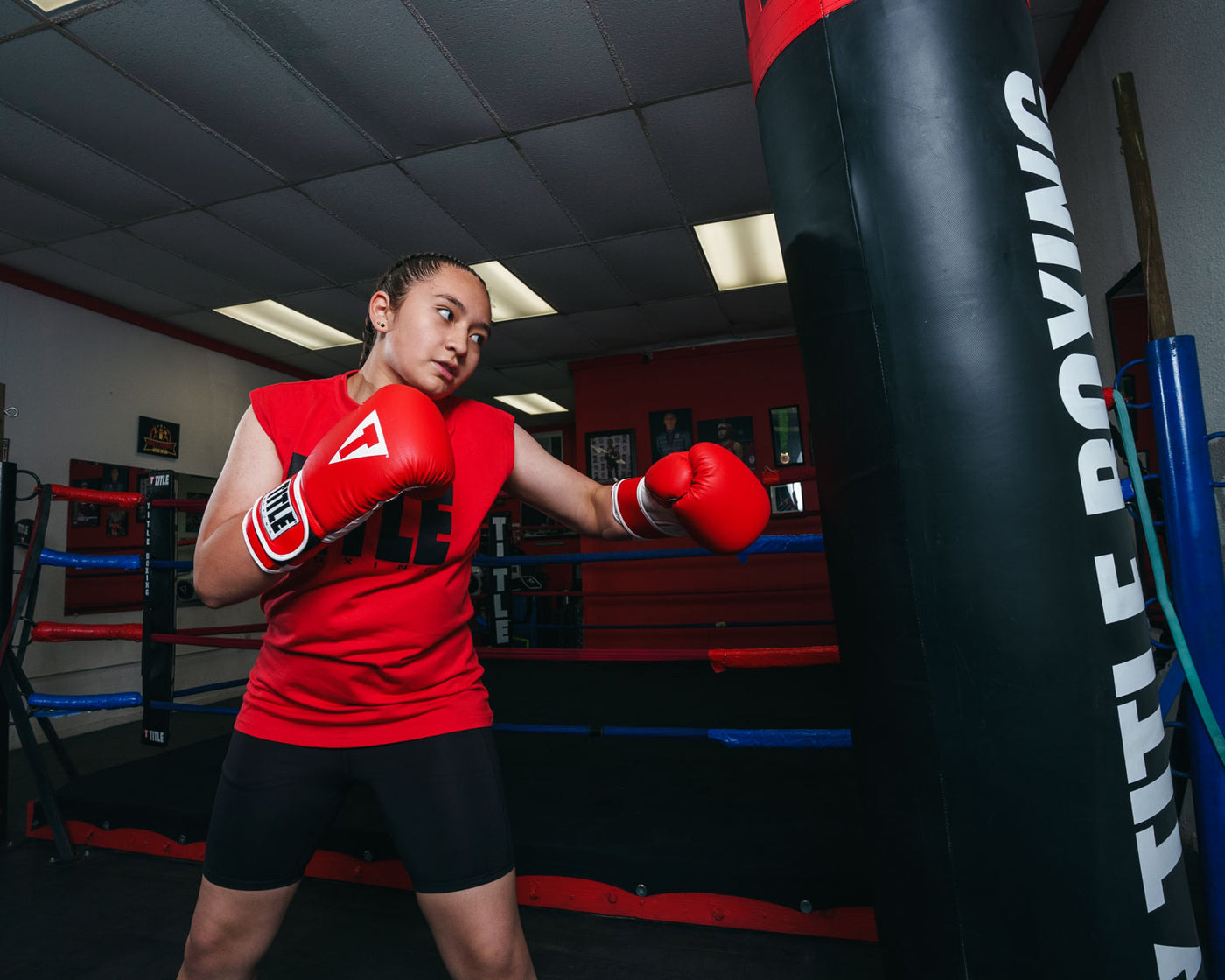 variant:Red/White::TITLE Boxing Pro Style Leather Training Gloves 3.0 left hook