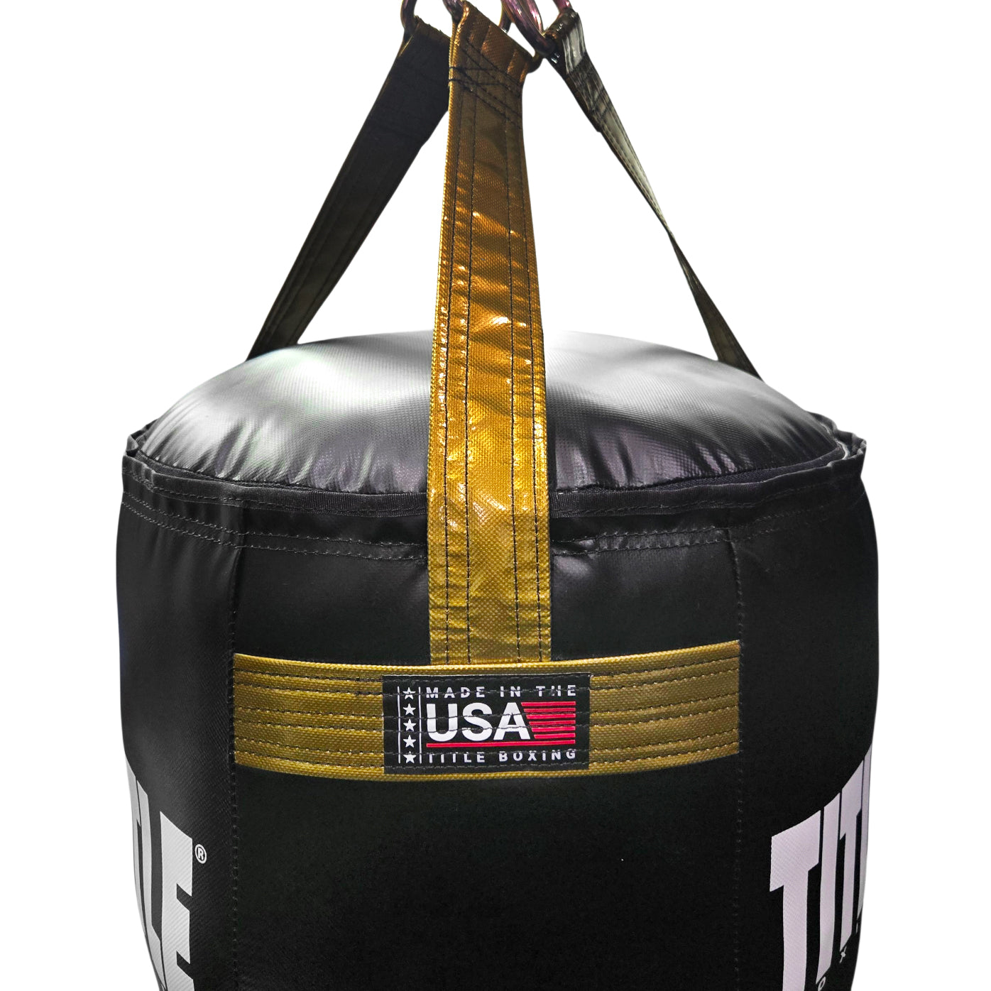 variant:Black/Gold::TITLE Boxing Made in the USA Angled Punching Bag closeup of Made in USA tag
