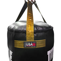 variant:Black/Gold::TITLE Boxing Made in the USA Angled Punching Bag closeup of Made in USA tag