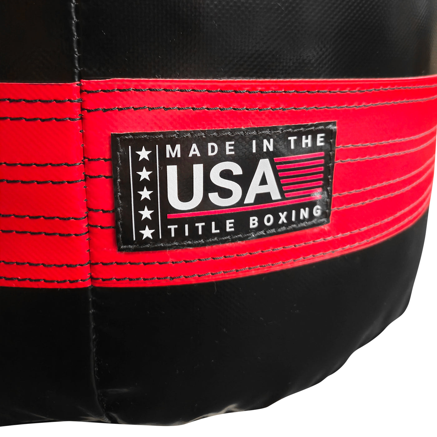 variant:Black/Red::TITLE Boxing Made in the USA 135lb Punching Bag closeup of Made in USA label