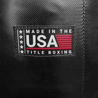 variant:Black/Black::TITLE Boxing Made in the USA 100lb Punching Bag closeup of Made in the USA label