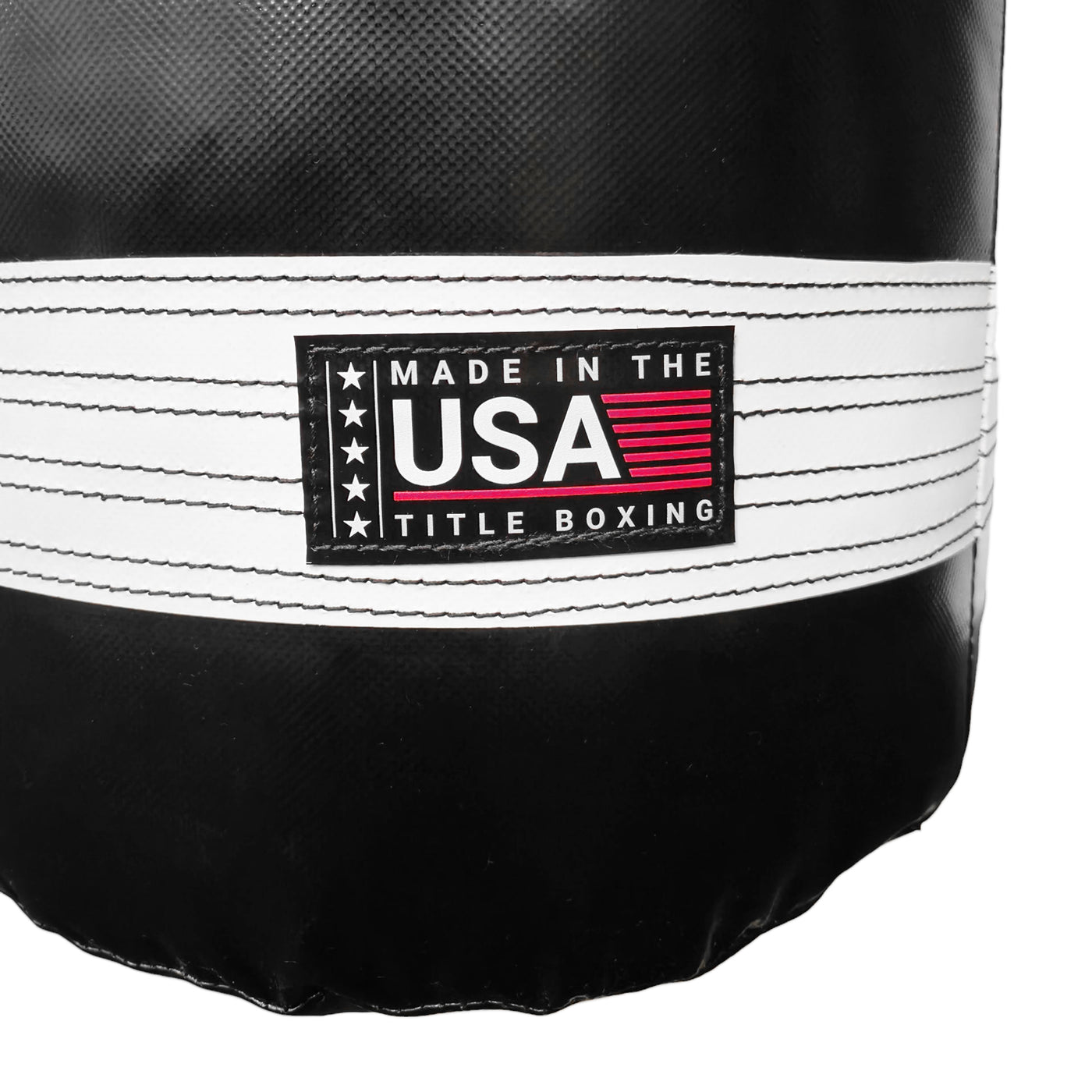 variant:Black/White::TITLE Boxing Made in the USA 135lb Thai Heavy Bag closeup of Made in USA label