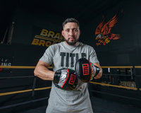 variant:lifestyle::TITLE Boxing Valiant Micro Mitts coach with mitts