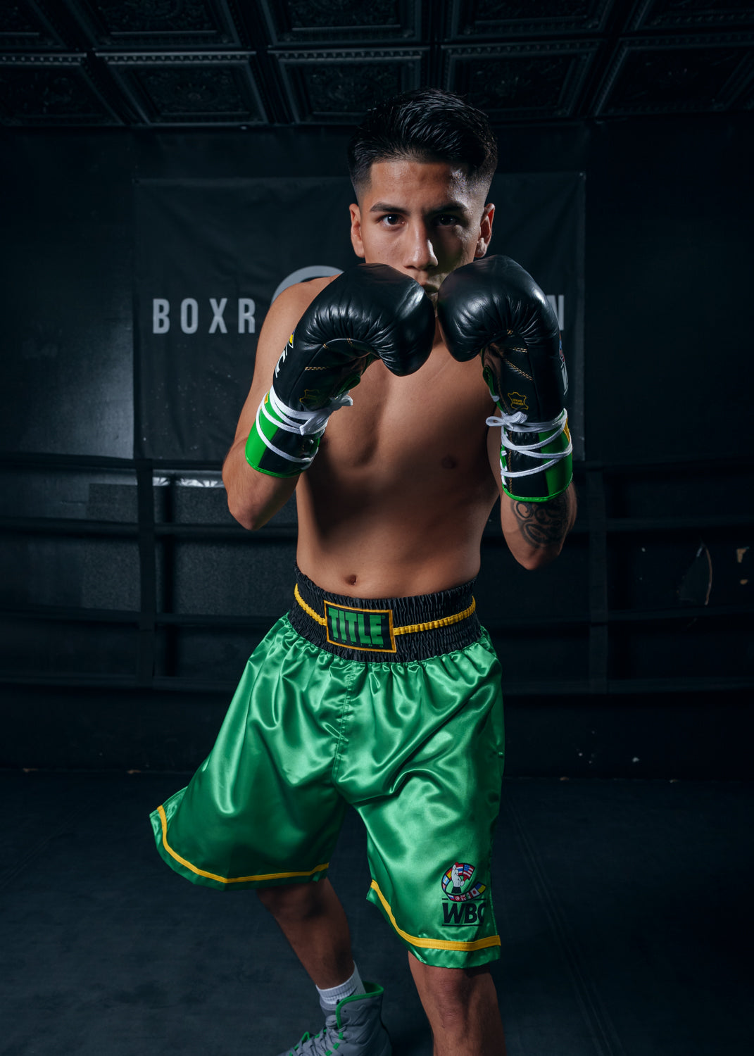variant:Green/Black::WBC by TITLE Boxing Professional Boxing Trunks boxing pose