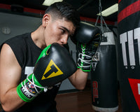 variant:lifestyle::WBC by TITLE Boxing Sparring Gear Bundle gloves on boxer in the gym