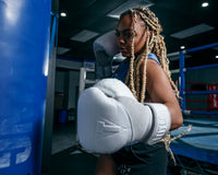 variant:lifestyle::TITLE White Boxing Pro Bag Gloves  girl punching bag