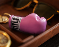 variant:pink::TITLE Boxing Excel Glove Keyring laying down