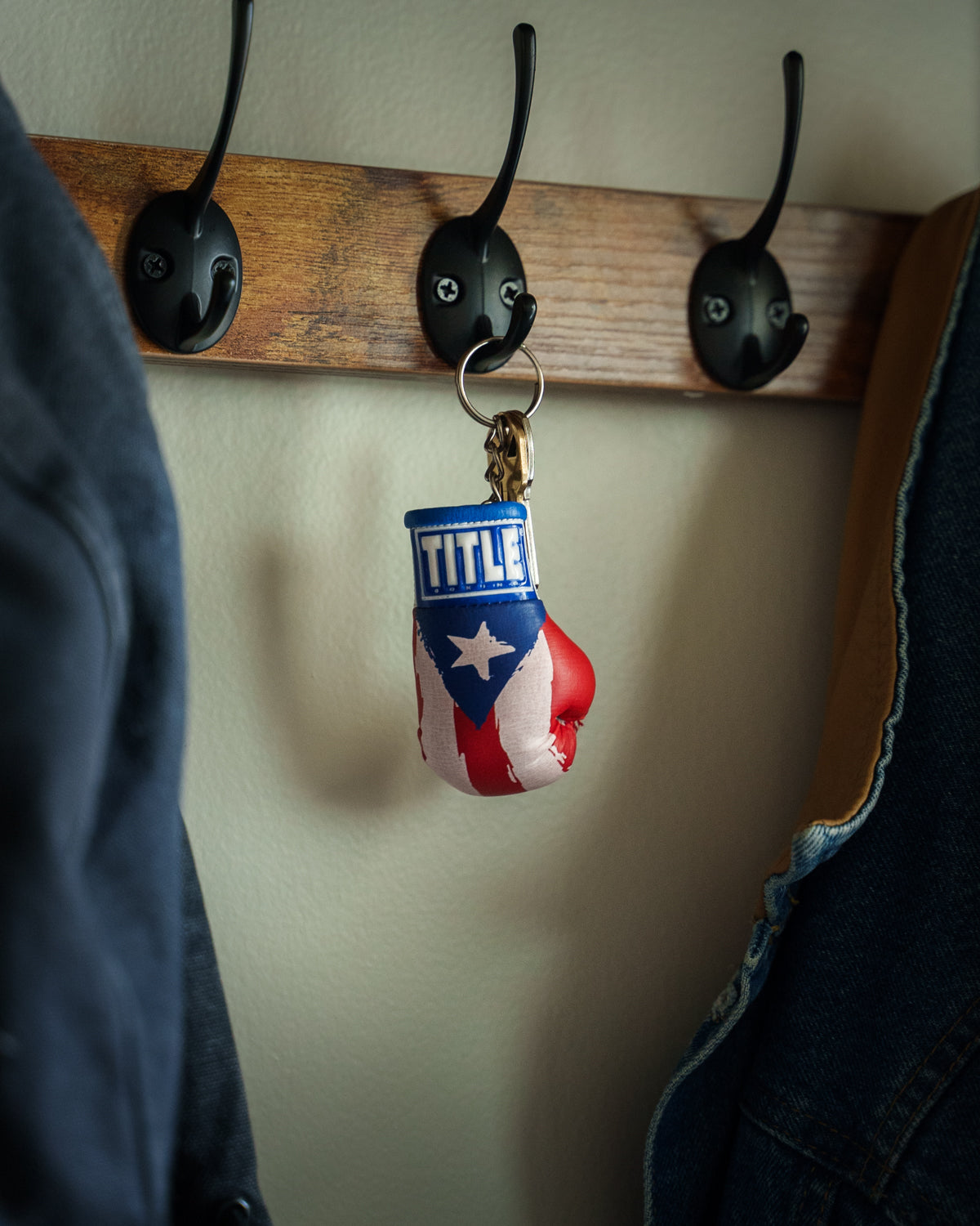 variant:White/Red/Blue::TITLE Boxing Excel Glove Keyring hanging on hook
