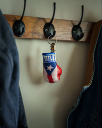 variant:White/Red/Blue::TITLE Boxing Excel Glove Keyring hanging on hook