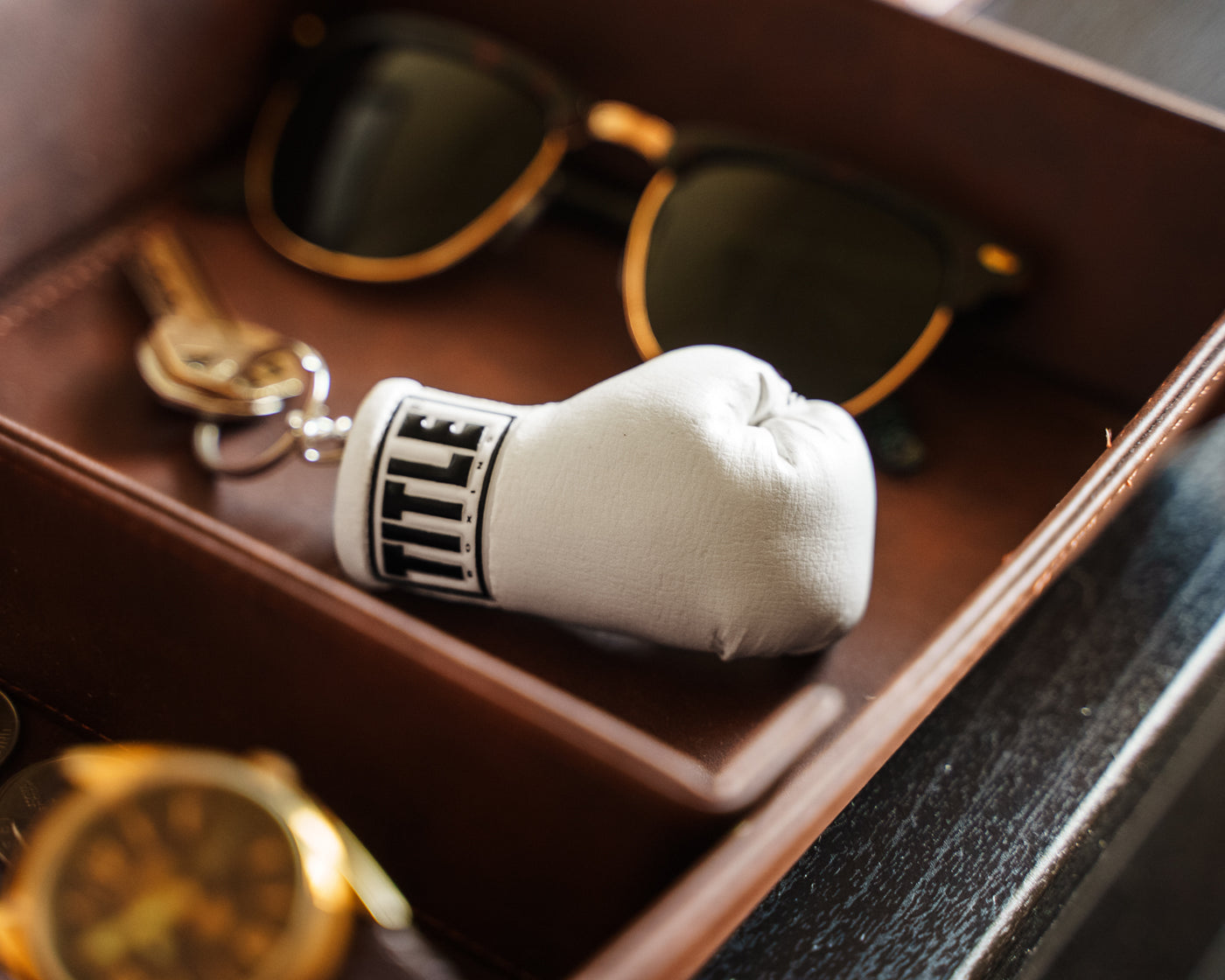variant:white::TITLE Boxing Excel Glove Keyring laying down