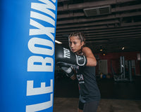 variant:Black/White::TITLE Boxing Dynamic Strike Heavy Bag Gloves left jab