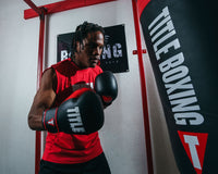 variant:Black/Red::TITLE Boxing Dynamic Strike Heavy Bag Gloves boxing stance