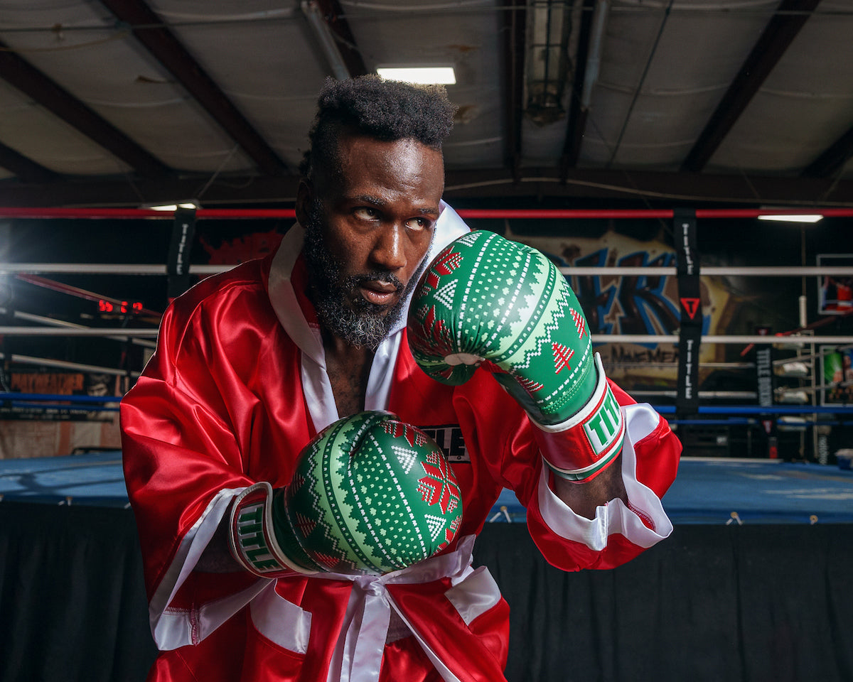 variant:green::TITLE Boxing Limited Edition Deck the halls bag gloves boxing pose