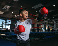 variant:red/black::TITLE Boxing Aerovent Youth Gloves kid left jab