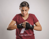 variant:lifestyle::Fighting Sports Gloves and Wraps Bundle black wraps on boxer's hands