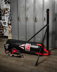 variant:lifestyle::TITLE Classic Boxing Glove & Bag Bundle in the gym