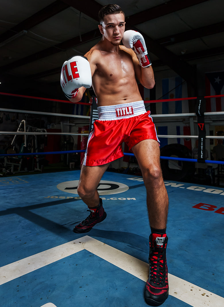 variant:Black/Red::TITLE Boxing Predator Shoes 2.0 man in ring posing
