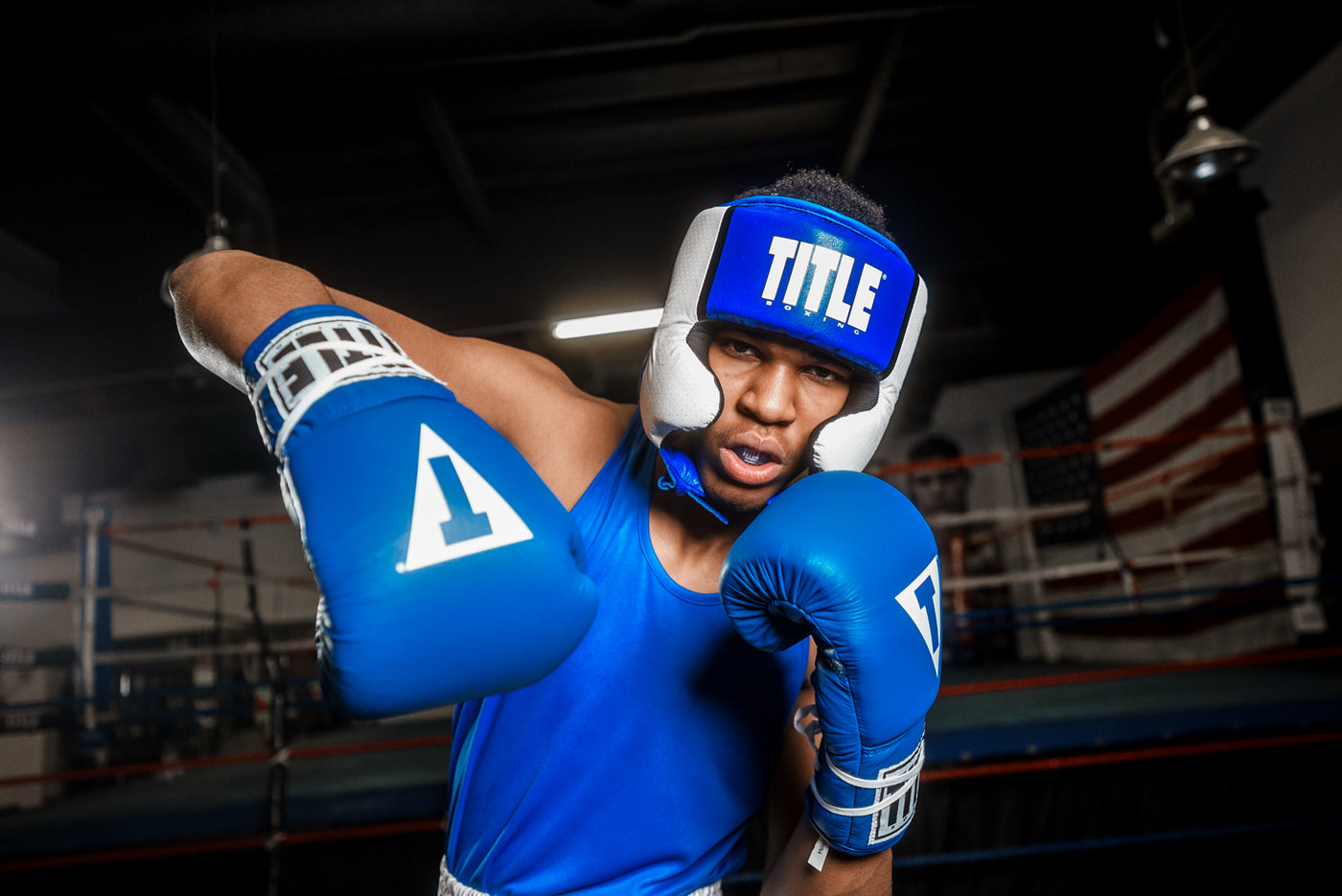 variant:blue::TITLE Boxing Aerovent Elite USA Boxing Competition Headgear – With Cheeks guy right punch
