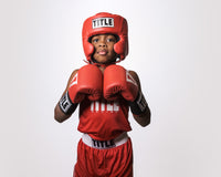 variant:red::TITLE Boxing USA Boxing Competition Headgear - With Cheeks kid standing hands together