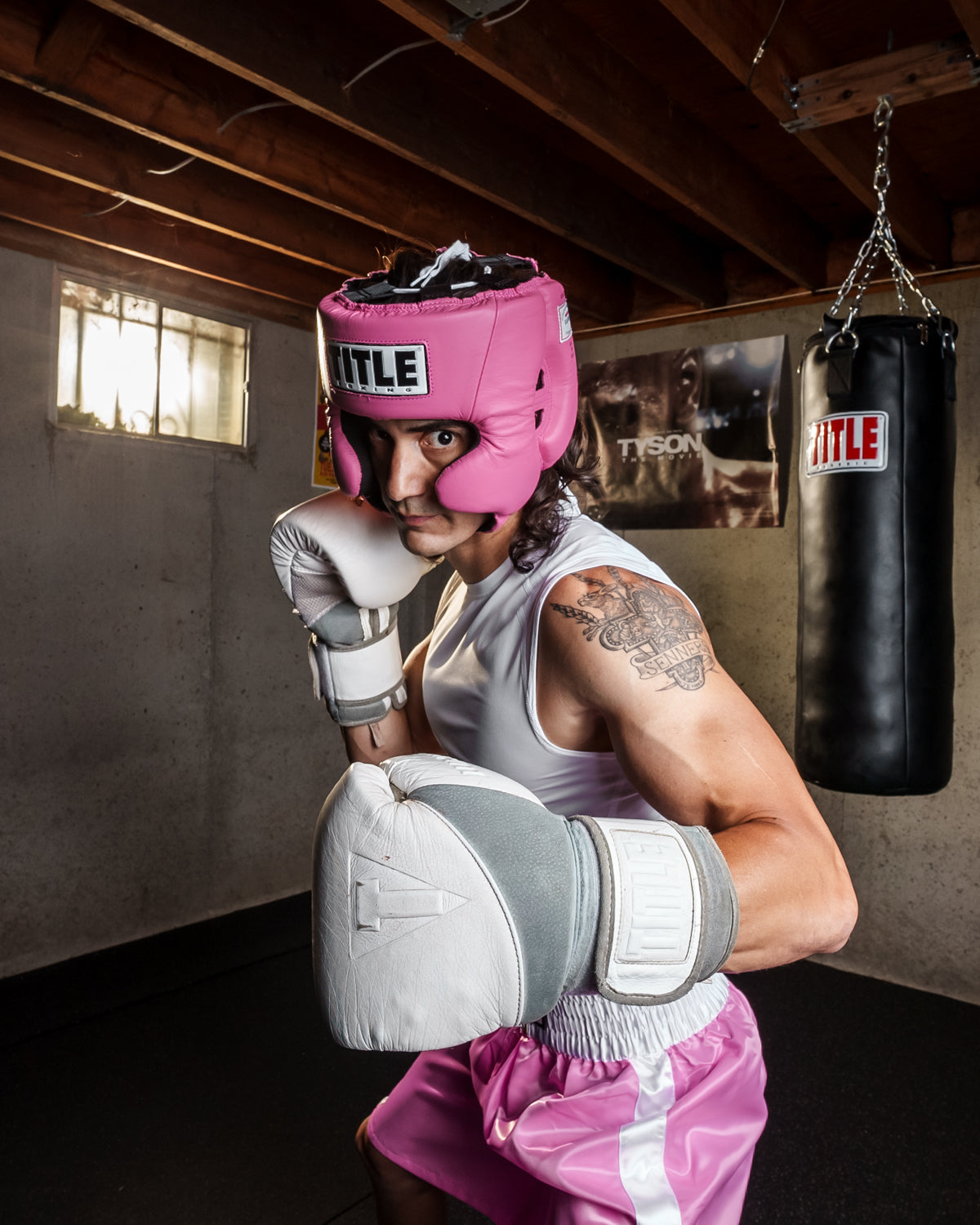 variant:pink::TITLE Boxing USA Boxing Competition Headgear - With Cheeks girl standing in ring