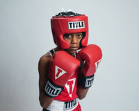 variant:red::TITLE Boxing USA Boxing Competition Headgear - With Cheeks kid posing 