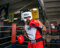 variant:white::Boxer with white headgear with checks