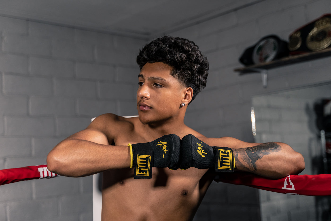 variant:black/yellow::TITLE Boxing Attack Nitro Speed Wraps 2.0 guy standing in ring