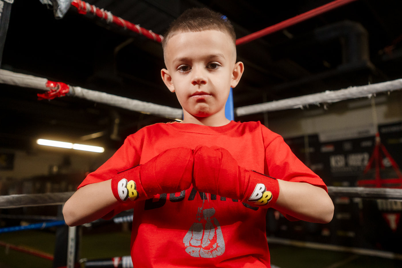 variant:red::BOOM BOOM Boxing Youth Flex Hand Wraps kid hands together