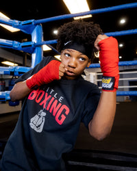 variant:red::BOOM BOOM Boxing Youth Flex Hand Wraps kid throwing left uppercut