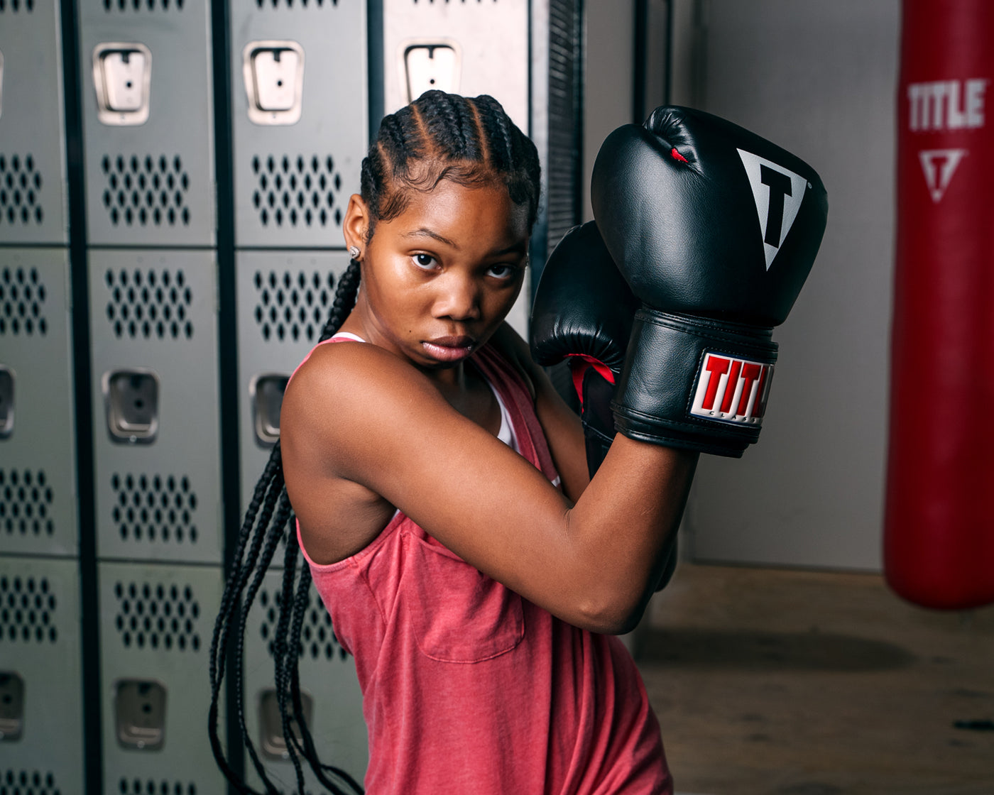 variant:lifestyle::TITLE Classic Boxing Gloves girl both hands up in x