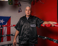 variant:black::TITLE Old School Corner Jacket 2.0 coach in ring corner