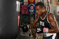 variant:black/white::TITLE Classic Pro Style Training Gloves 3.0 guy hitting bag