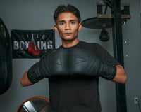 variant:black::TITLE Black Bolstered Leather Bag Gloves guy hands together