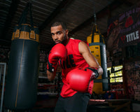 variant:red/black::TITLE Boxing Dauntless Training Gloves boxing pose
