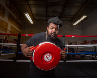 variant:red/white::TITLE Boxing Fighting Fresh Punch Shield guy posing with punch shield