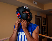 variant:black::Fighting Leather Sparring Headgear guy adjusting headgear