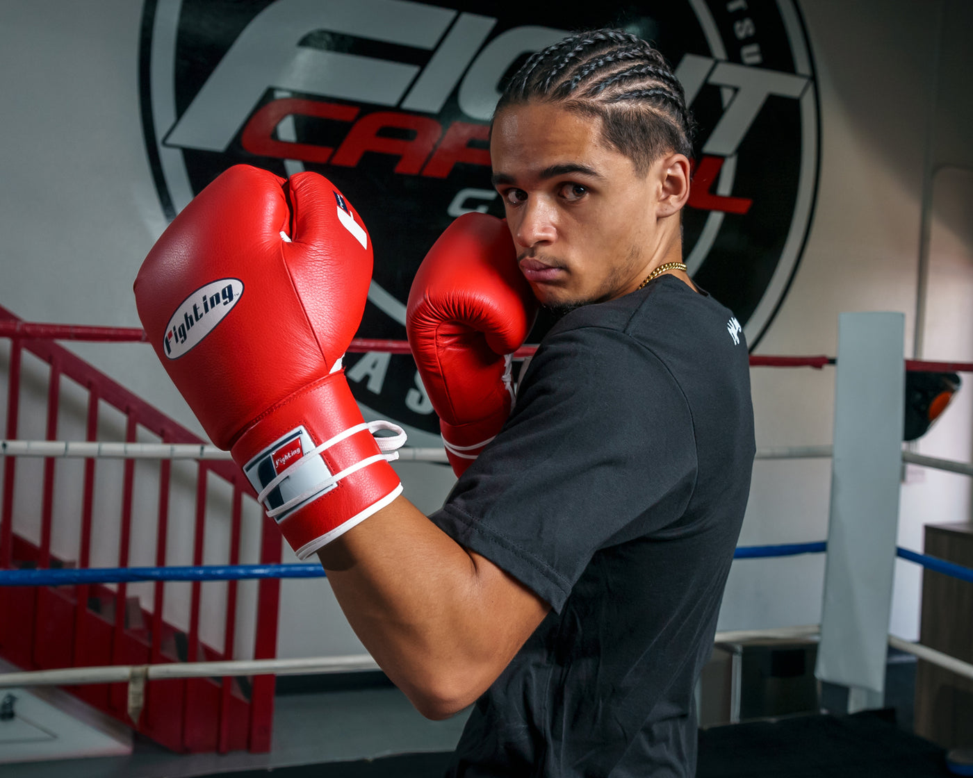 variant:red::Fighting Fury Professional Lace Training Gloves guy posing with gloves