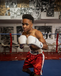  variant:White::Fighting Fearless Certified Pro Fight Gloves II boy posing in ring