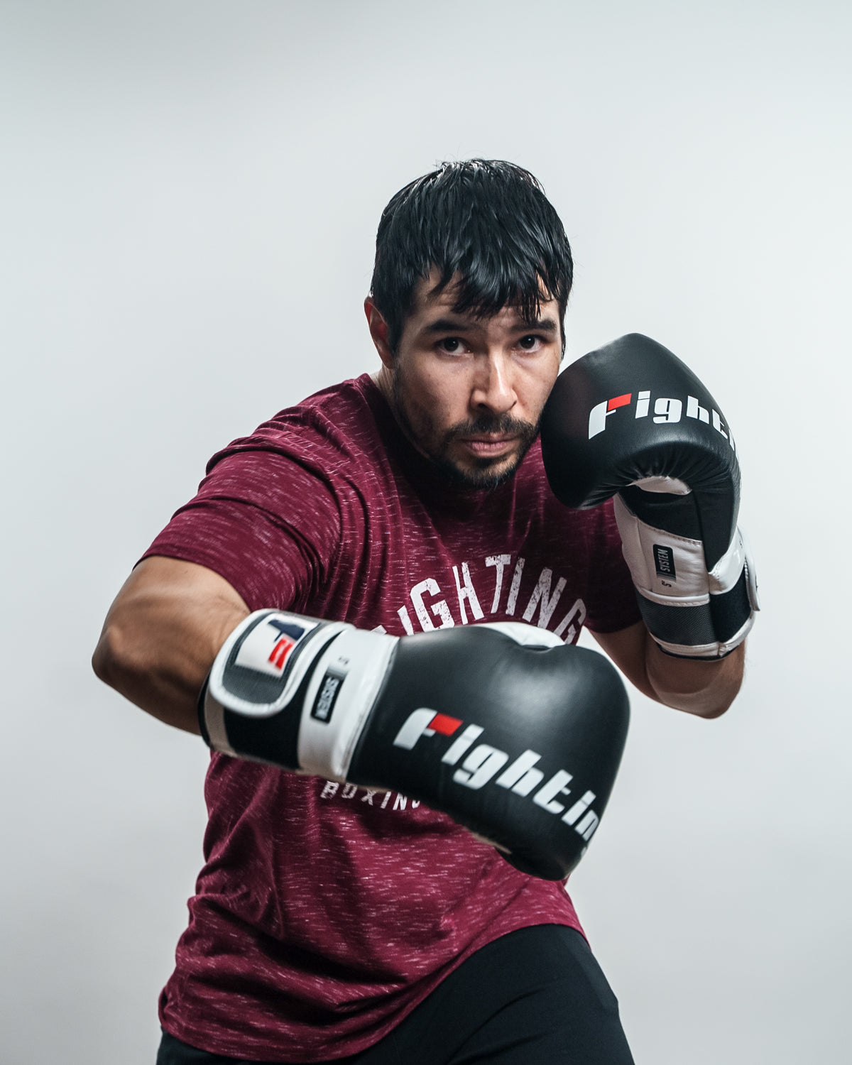 variant:Black/White::Fighting S2 GEL Power Sparring Gloves man throwing punch